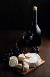 variety-of-different-cheese-with-wine-and-fruits
